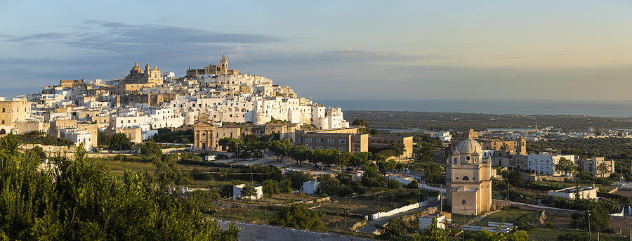 View of the city of Ostuni, early morning light Photograph by Deimagine