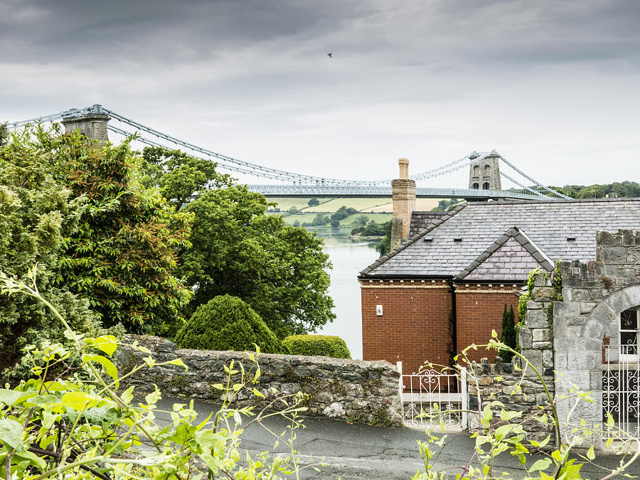 View of the Menai suspension bridge (1826) designed by Thomas Telford from near Bangor:The Wales Coast Path - north Wales Photograph by Charles Hawes