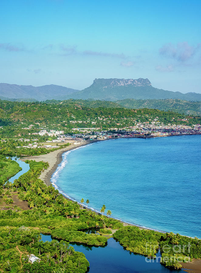 View over Bahia de Miel towards city and El Yunque Mountain, Baracoa ...