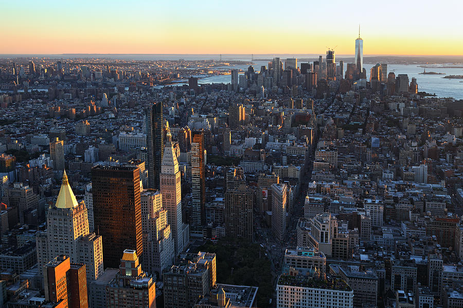 View to Downtown Manhattan at sunset Photograph by Rainer Grosskopf