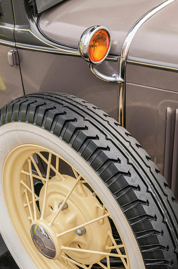Vintage Auto And Spare Tire Photograph