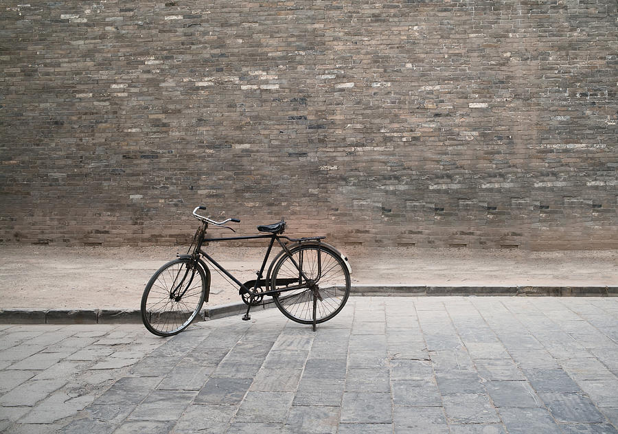 Vintage Bycicle and brick wall Photograph by Xuanyu Han