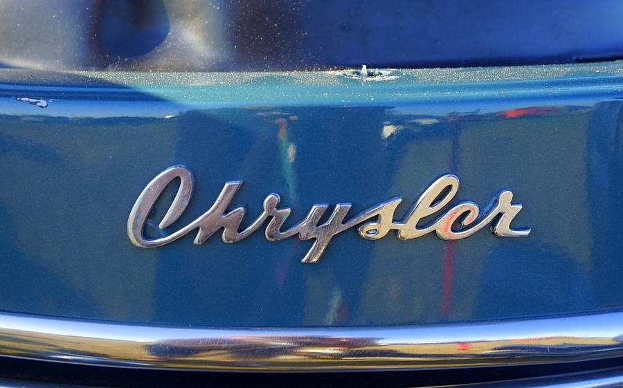 Car Photograph - Vintage Chrysler Emblem by Laurie Perry