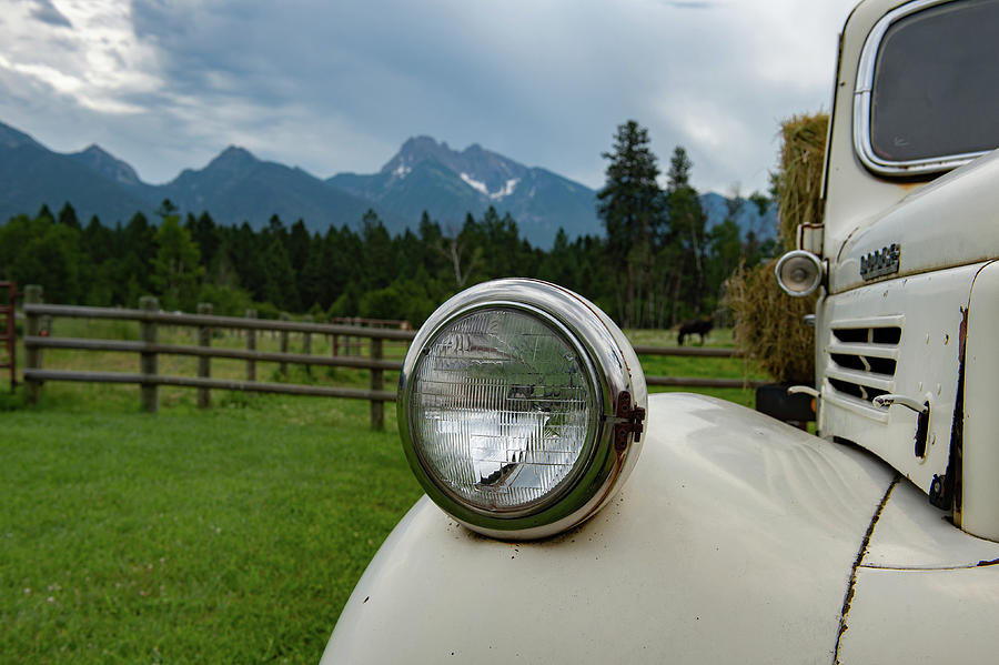 Vintage Dodge Headlight at Sky Ridge Ranch Photograph by Bonnie Colgan