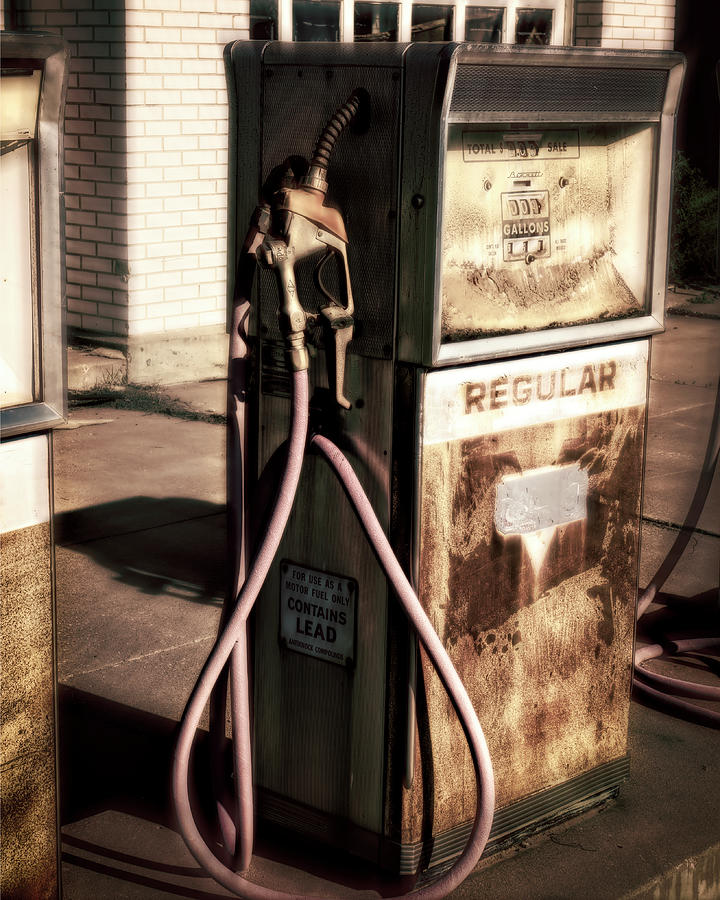 Vintage Gas Pump In Sepia Photograph