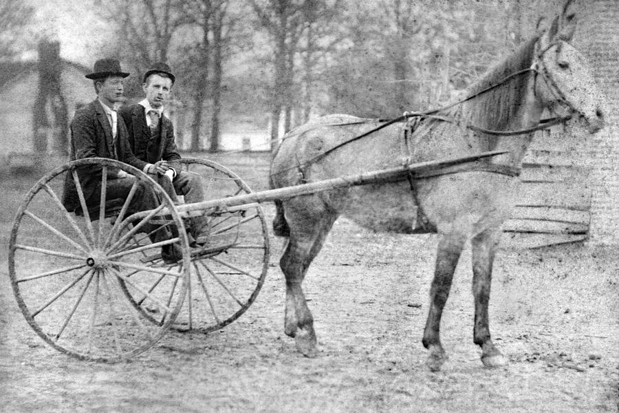 Vintage image of men in horse carriage Photograph by Thinkstock Images
