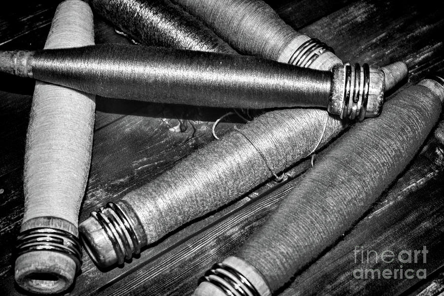 Vintage Industrial Sewing Spools black and white Photograph by Paul Ward