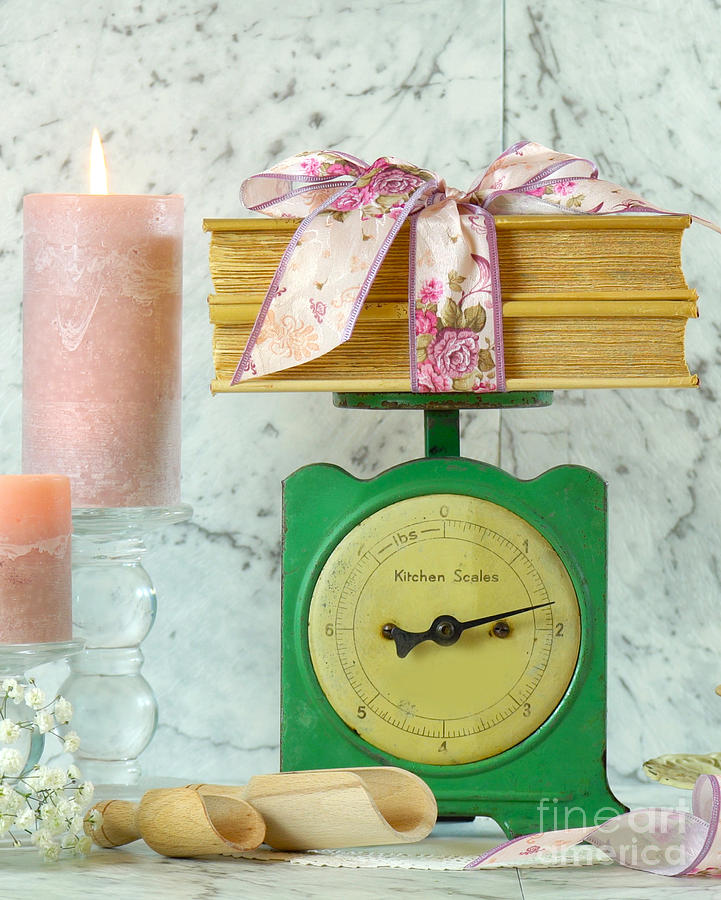 Vintage kitchen scale decor in soft dusty pink and mint green tones. Photograph by Milleflore Images