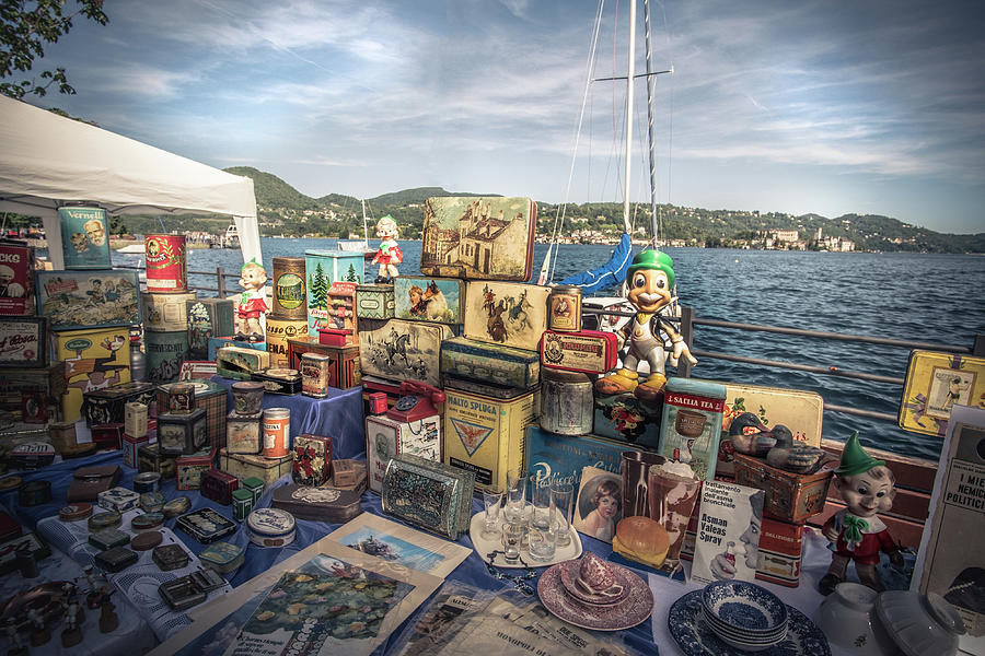 Vintage Photograph - Vintage Markeplace Stand On Lake Orta by Luca Lorenzelli