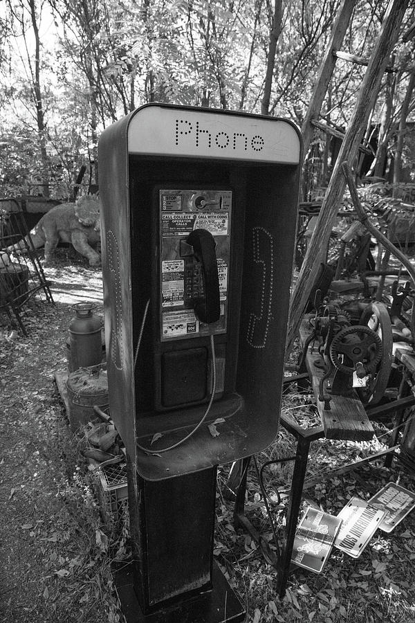 Vintage pay phone in New Mexico in black and white Photograph by Eldon McGraw