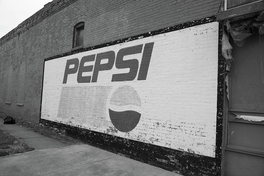 Vintage Pepsi mural advertisement on Historic Route 66 in Galena Kansas in black and white Photograph by Eldon McGraw