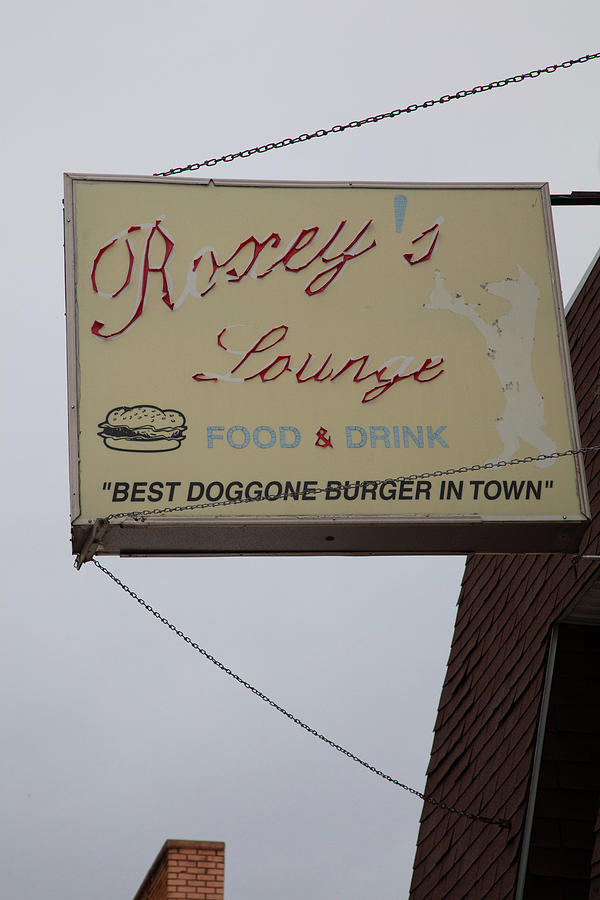 Vintage sign for Roxeys Lounge in Ontonagon Michigan Photograph by Eldon McGraw