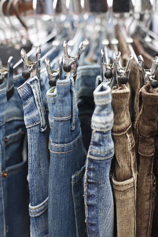 Vintage Style Denim Jeans For Sale At Clothing Store Photograph by Bunhill
