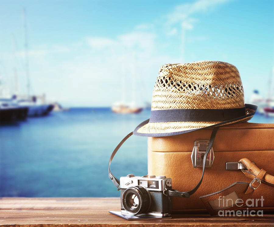Vintage Suitcase With Retro Camera And Summer Hat Photograph