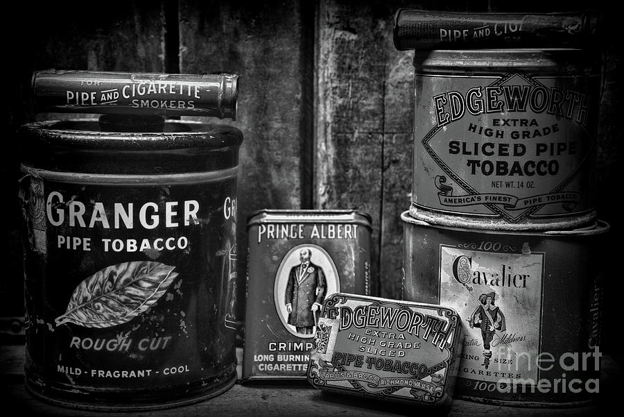 Vintage Tobacco Tins in black and white Photograph by Paul Ward