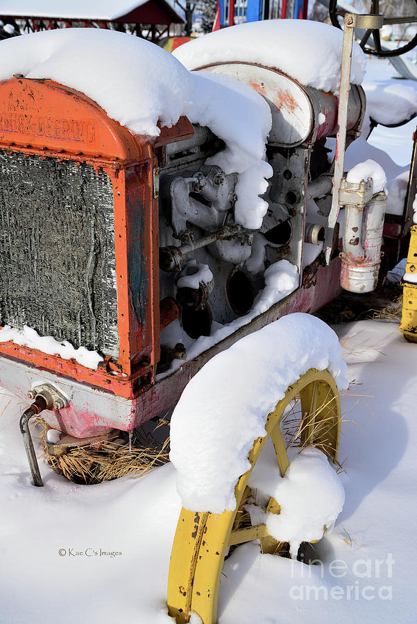 Vintage Tractor in Snow Photograph by Kae Cheatham