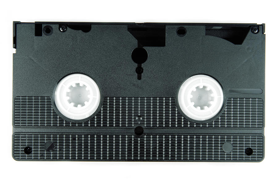 Vintage video tape casette isolated on white Photograph by Severija Kirilovaite