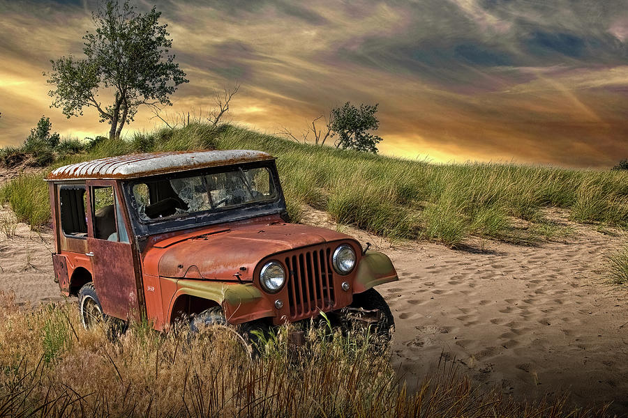 Vintage Willy Jeep on a Sand Dune at Sunset Photograph by Randall Nyhof