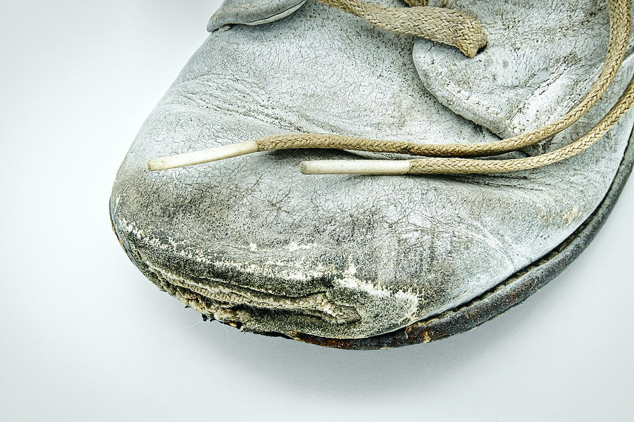 Vintage Worn Baby Shoe Photograph by Stuart Litoff