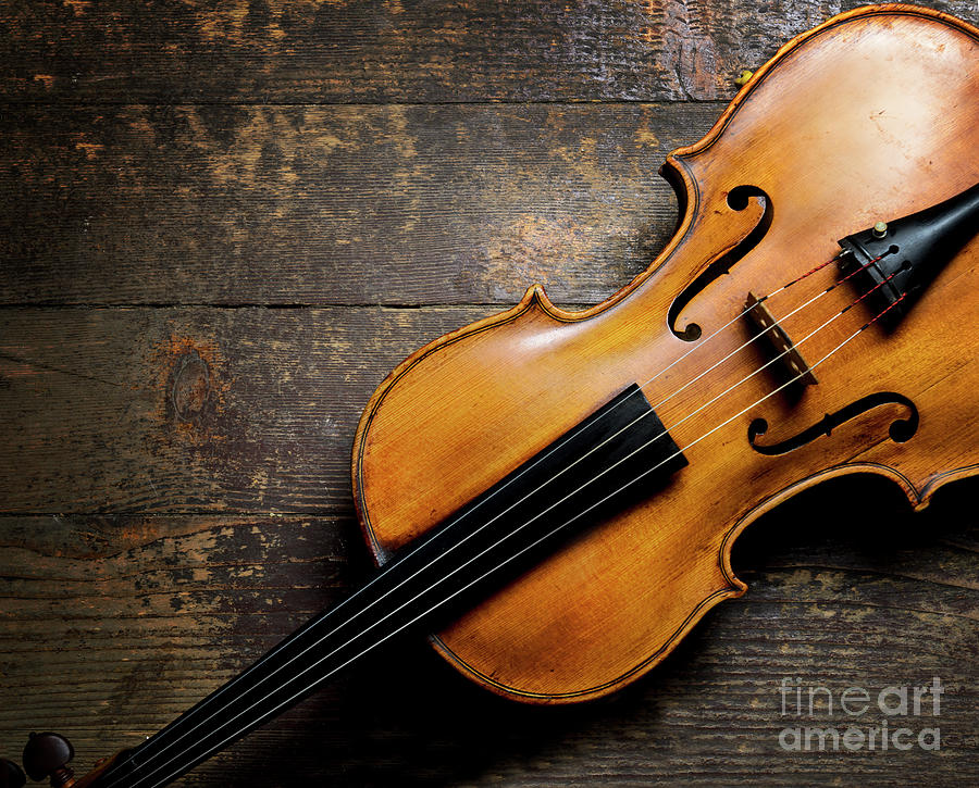 Violin on rustic wooden floor from above Photograph by Jelena Jovanovic