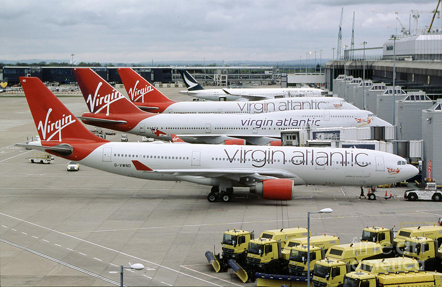 Virgin Atlantic Aircraft Lined up at the Terminal Gates Photograph by