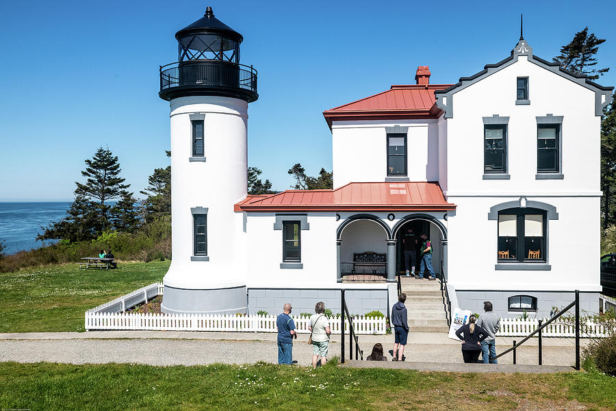 Visitors at Admiralty Head Lighthouse Photograph by Tom Cochran
