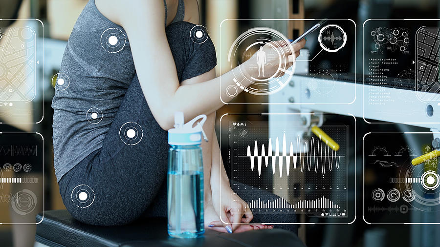 Vital sign sensing concept. Internet of Things. Health tech. Sports tech. Photograph by Metamorworks