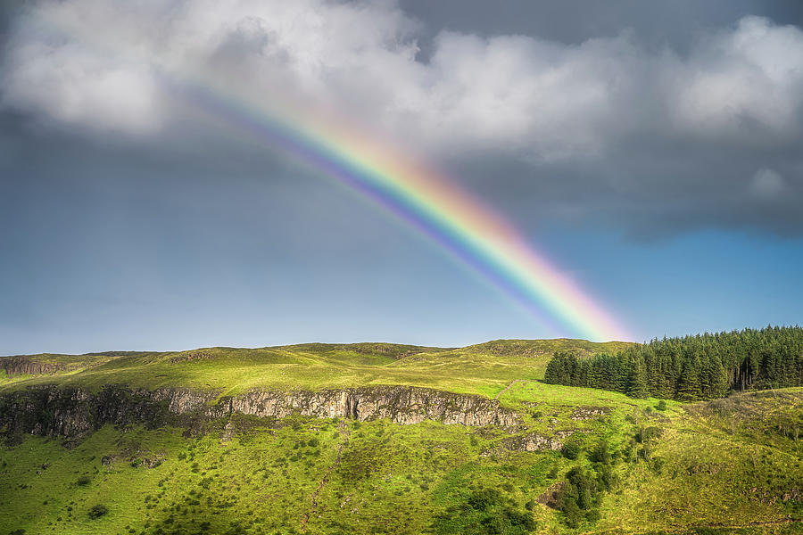 Vivid rainbow over hills and forests in Glenariff Forest Park 2 ...