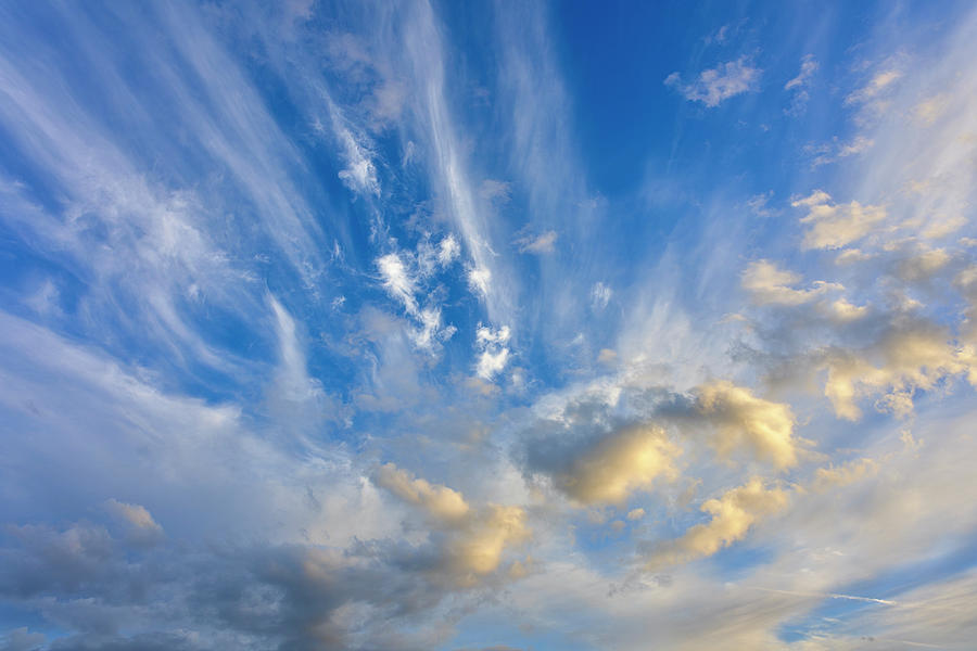 Vivid Skyscape with Streaking Cirrus and Sunlit Cumulus Clouds Photograph by Chris Anson