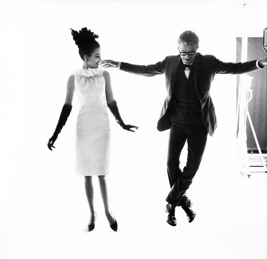 Actor Peter OToole Dancing With A Model Photograph by Bert Stern
