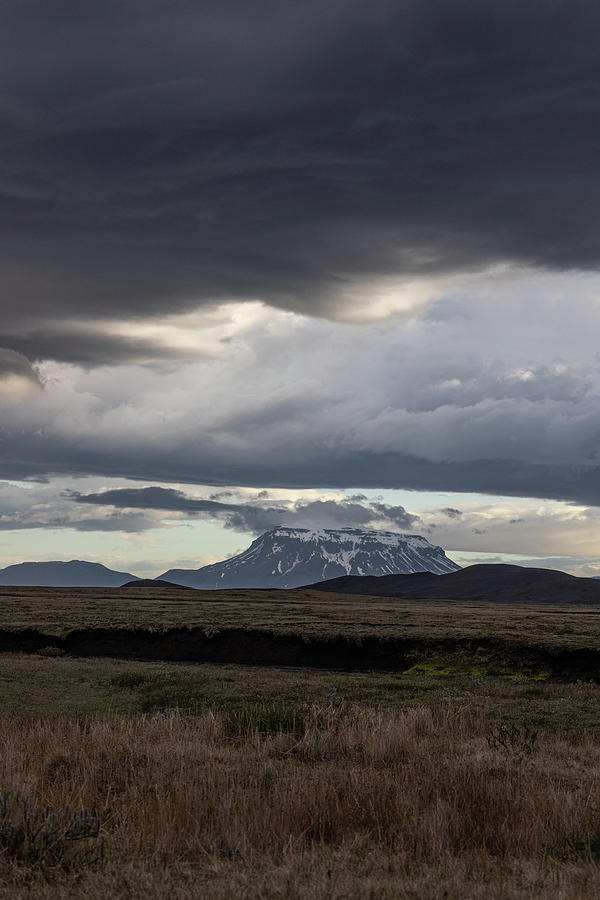 Volcano in Iceland with Clouds  Photograph by John McGraw