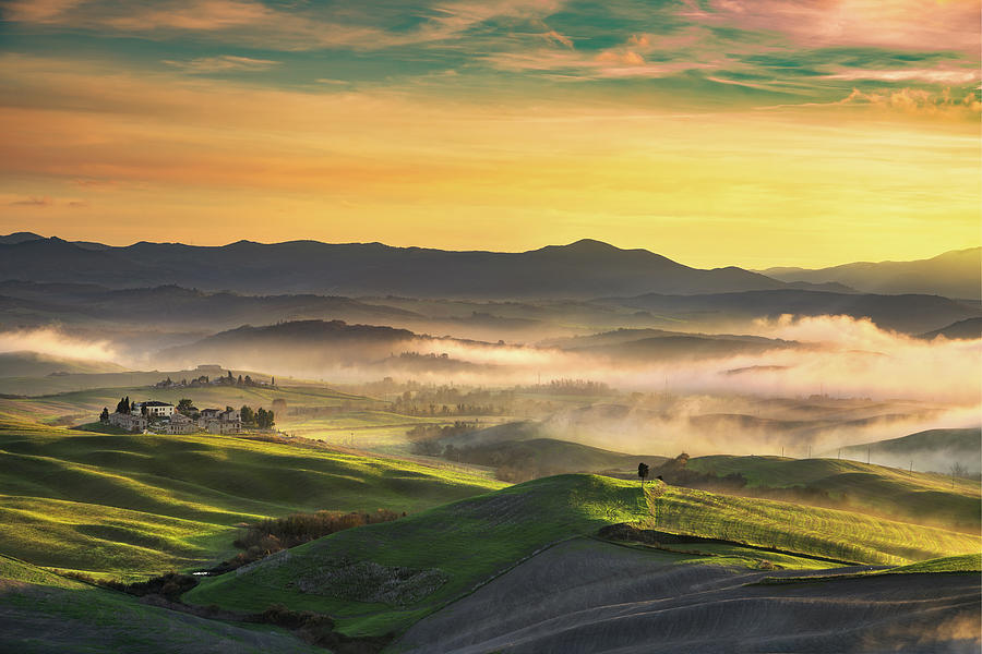 Volterra, foggy rolling hills at sunset. Tuscany Photograph by Stefano Orazzini