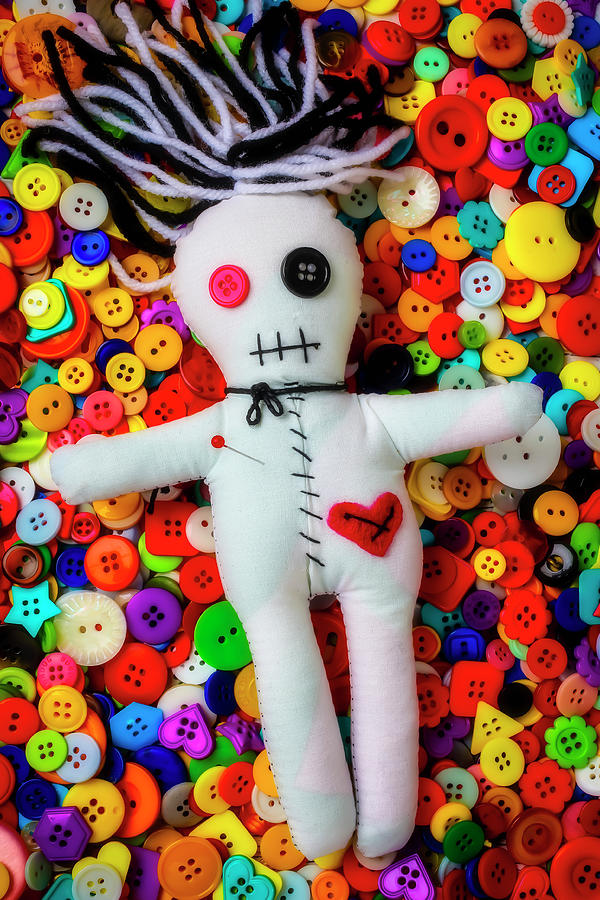 Voodoo Doll On Buttons Photograph by Garry Gay