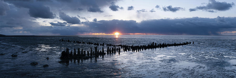 Wadden sea beach coast netherlands sunset Photograph by Sonny Ryse