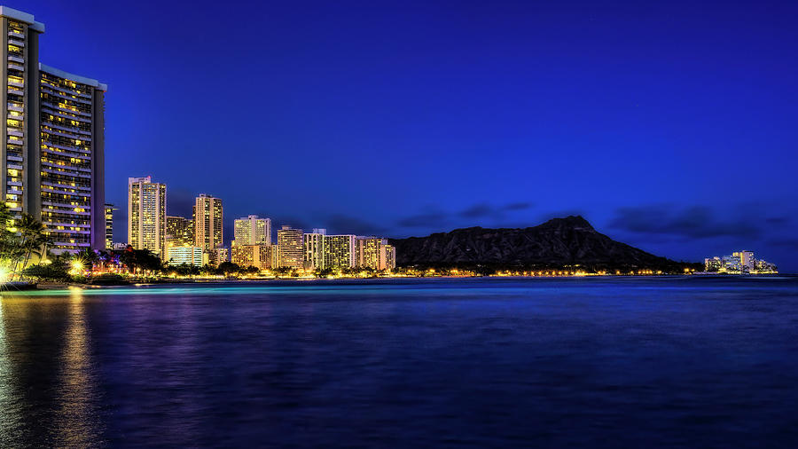 Waikiki at night Photograph by Bill Dodsworth