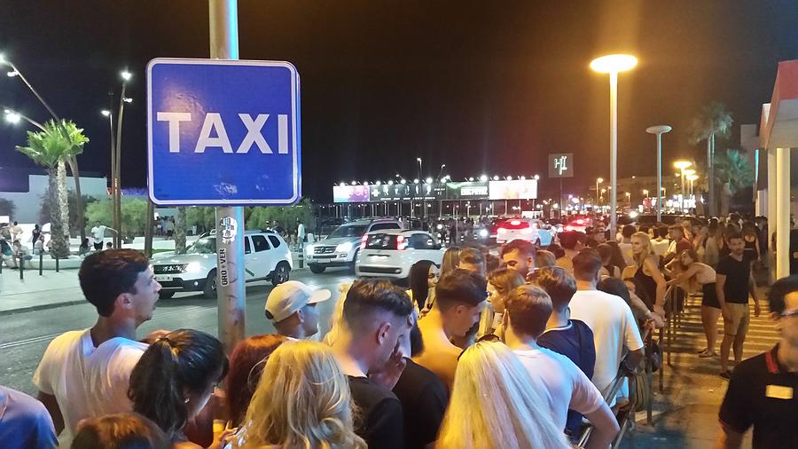 Waiting for taxis At rush hour Ibiza Spain Photograph by tzahiV