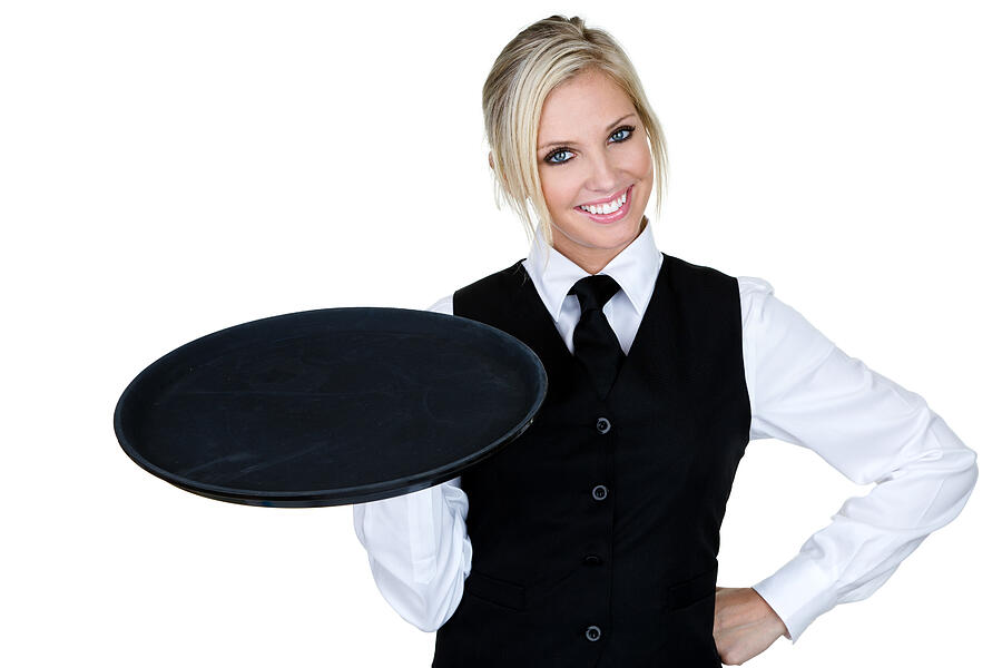 Waitress holding serving tray Photograph by Stockphoto4u
