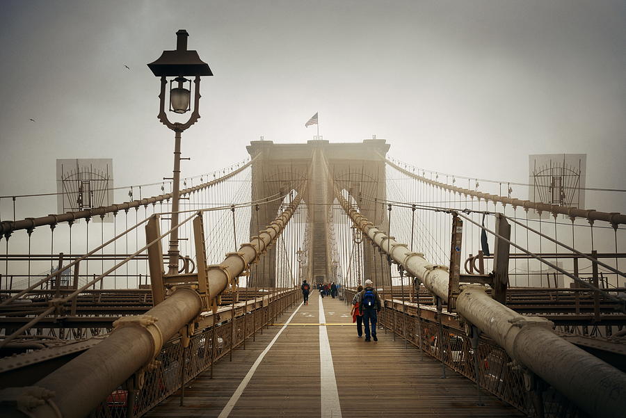 Walk on Brooklyn Bridge in a foggy day Photograph by Songquan Deng