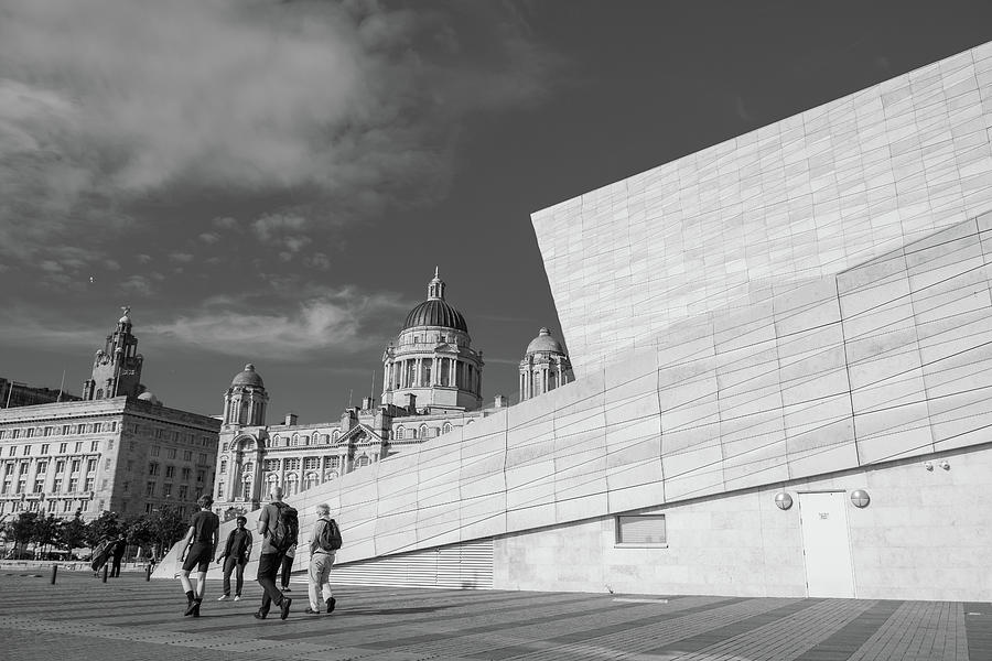 Walking along the converging diagonal of the perspective at the Liverpool Waterfront. Photograph by Iordanis Pallikaras