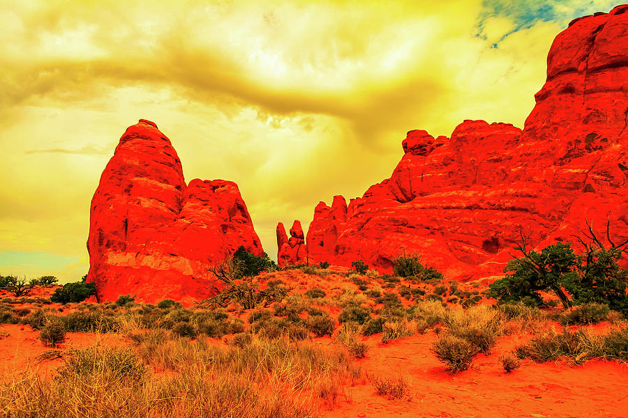 Walking among the stones at Arches National Park Photograph by Jeff Swan