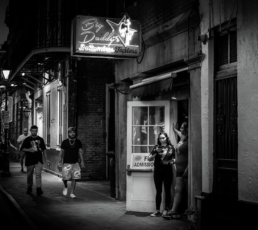 Walking By Big Daddys In Black and White Photograph by Greg and Chrystal Mimbs