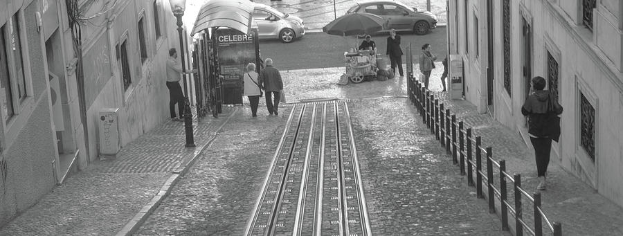 Walking  by the rails - Lisbon Photograph by Christina McGoran