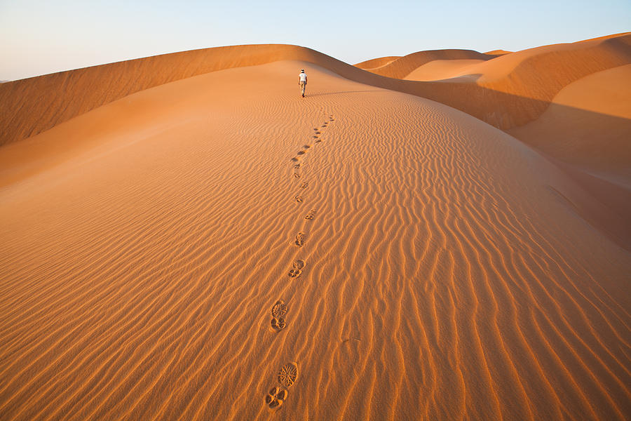 Walking in the sand dunes with foot prints Photograph by SeppFriedhuber Walking in the sand dunes with foot prints Photograph by SeppFriedhuber