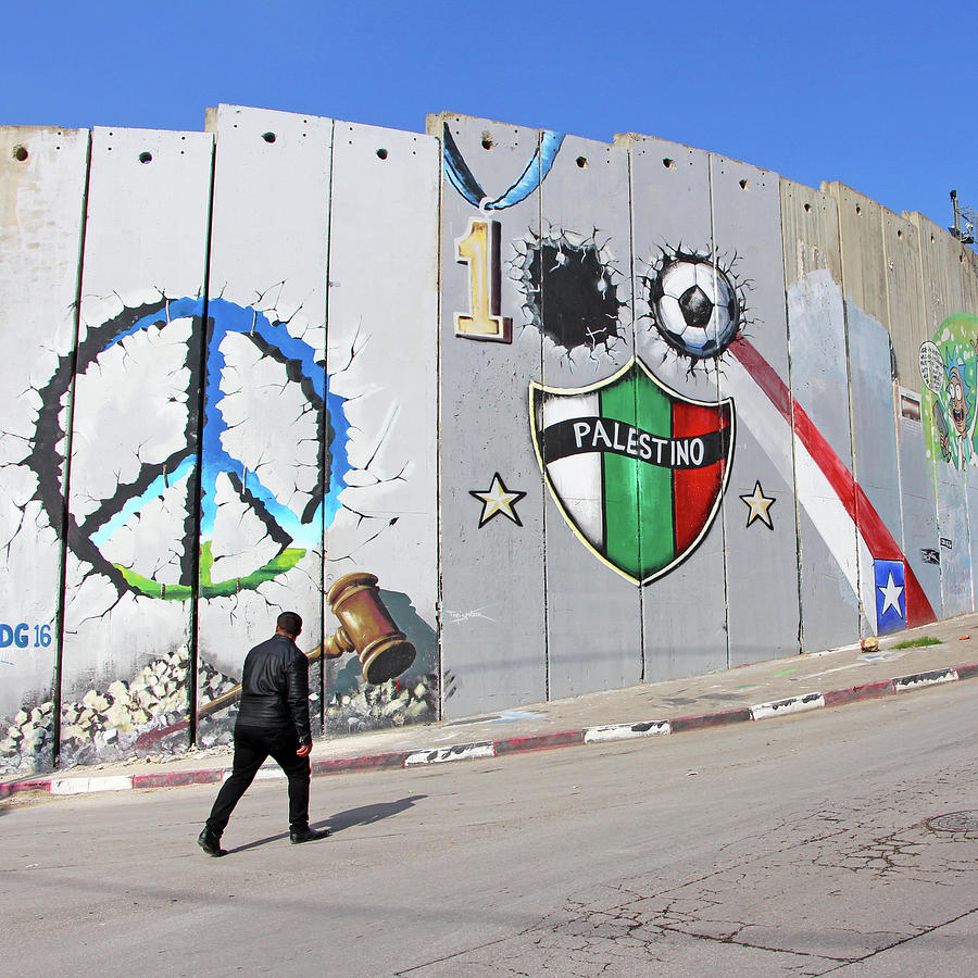 Walking Next to Apartheid Wall Photograph by Munir Alawi