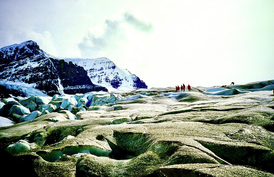 Walking on a Glacier Photograph by Gordon James