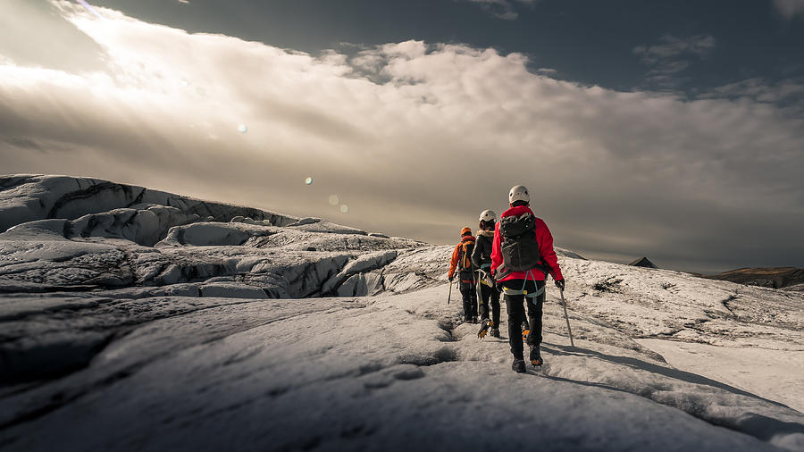 Walking on the glacier, Iceland Photograph by Theerawat Kaiphanlert