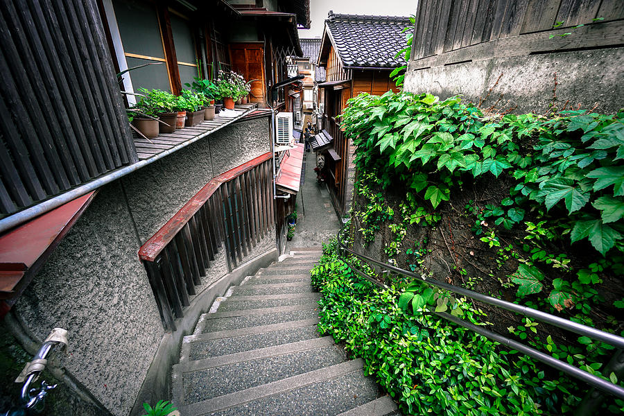 Walking with retro mood and unusual ambience along the dark narrow hill alley (暗がり坂) in Kazue-Machi Chaya District (主計町 茶屋街), Kanazawa (金沢) Japan Photograph by Totororo