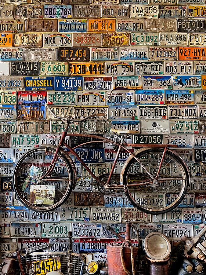 Wall Display - Vintage Bicycle and License Plates Photograph by Jerry Abbott