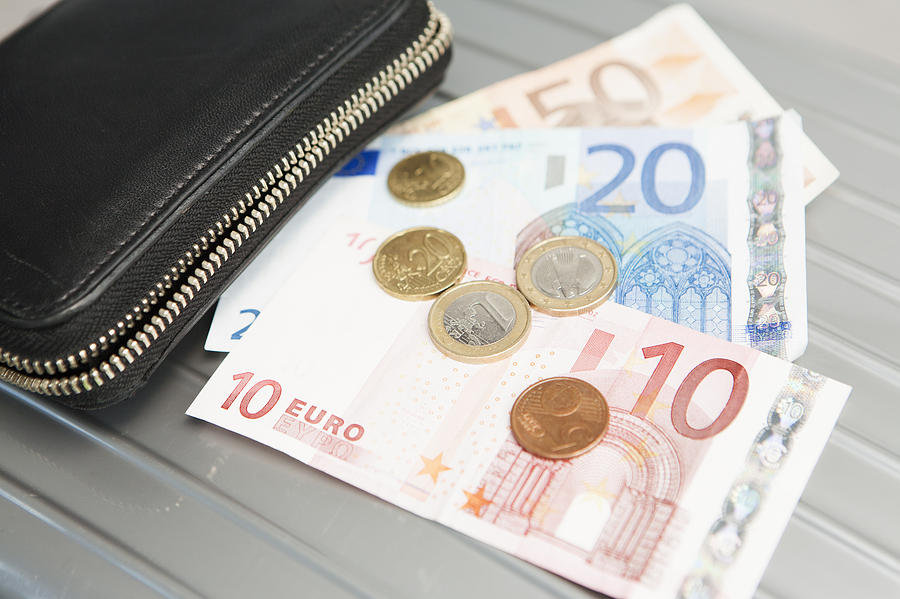 Wallet with euro notes and coins Photograph by Stefanie Grewel