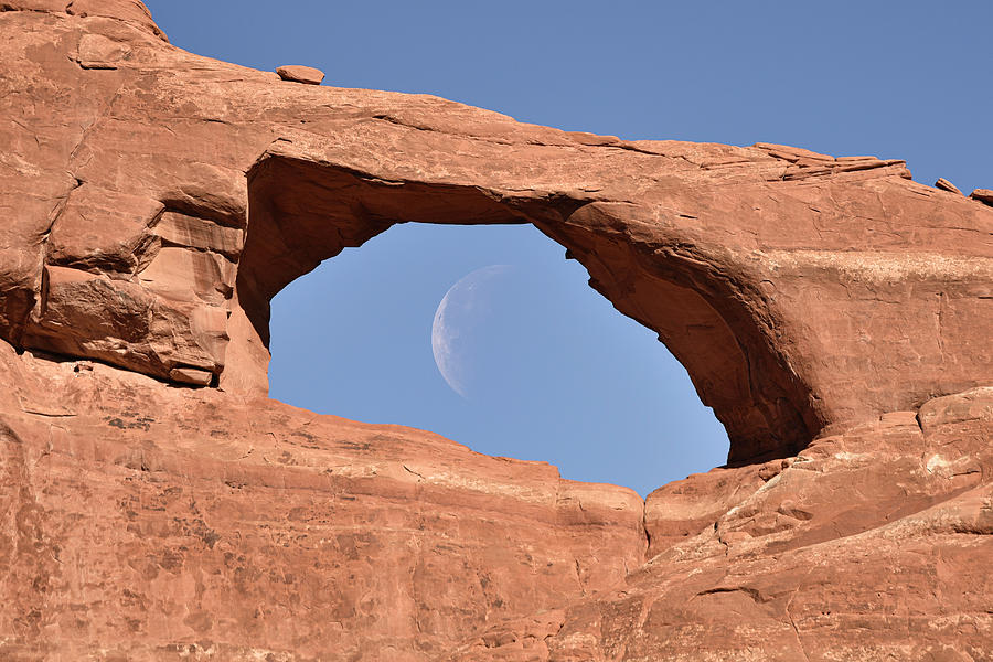 Wanning Crescent Moon Caught In The Middle Of Skyline Arch Photograph